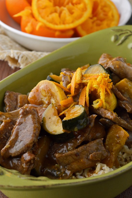 tender gluten free orange beef and summer squash stir-fry tossed